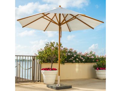 large garden umbrella on terrace with flowers