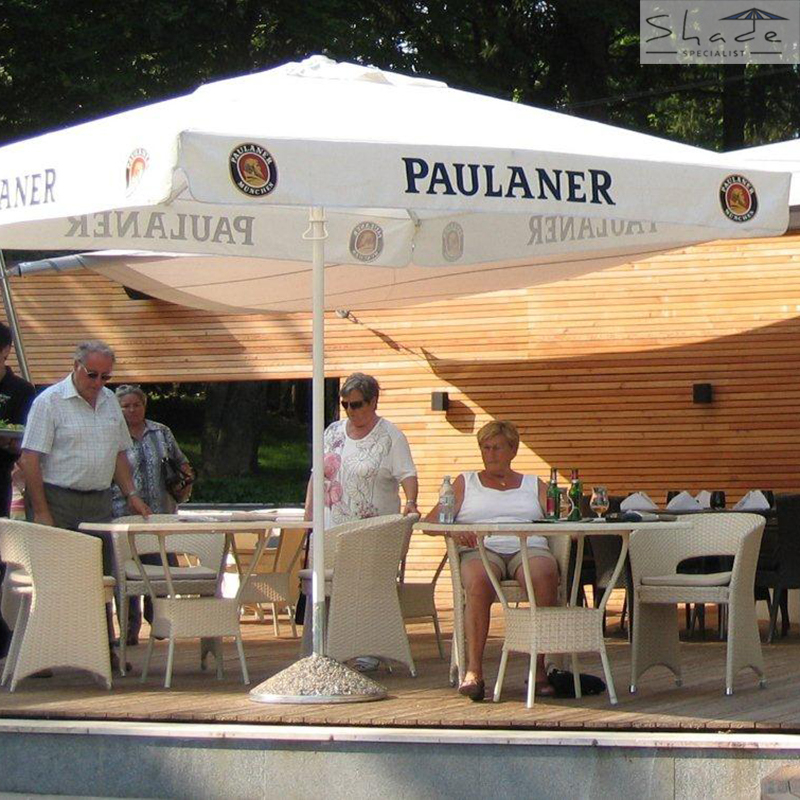 white branded parasol - paulaner